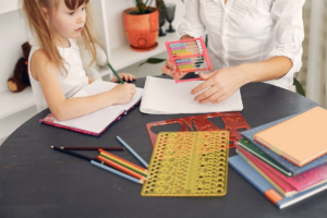 young student learning to write