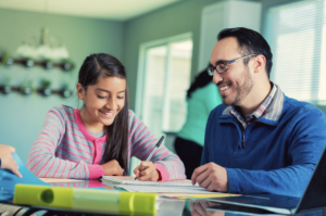 dad and daughter studying