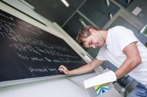 maths student at whiteboard