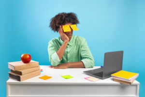 Student revising Chemistry at desk